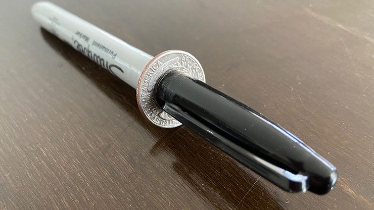 Sharpie thru Quarter by Tango