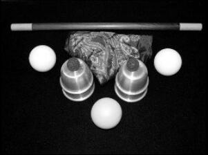 Scott Guinn - Table-Hopping Cups And Balls